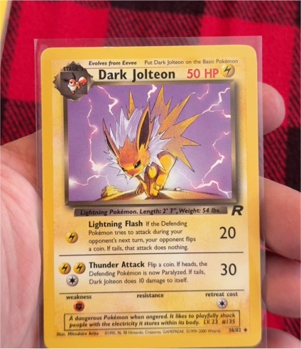 1999 Pokémon Team Rocket #38 Dark Jolteon — front