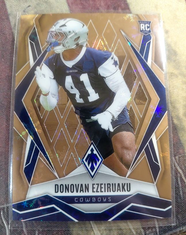 2025 Panini Phoenix #209 Donovan Ezeiruaku — front