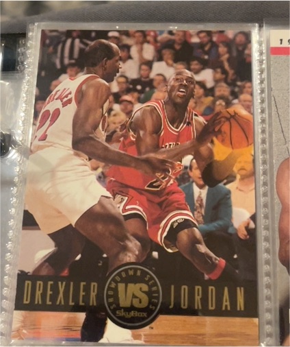 1993-94 SkyBox Premium Showdown Series #SS11 Michael Jordan vs Clyde Drexler — front