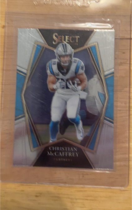 2021 Panini Select #107 Christian McCaffrey Premier Level — front