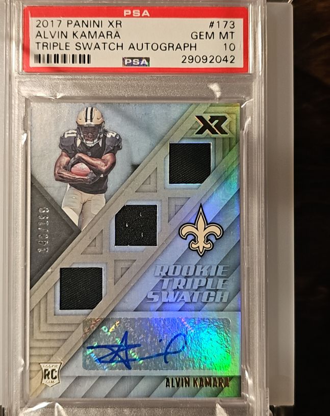 2017 Panini XR #173 Alvin Kamara Rookie Triple Swatch Autograph — front