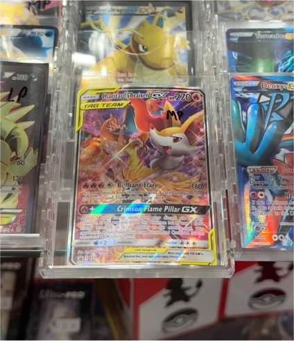 2019 Pokémon #008 Charizard & Braixen GX — front