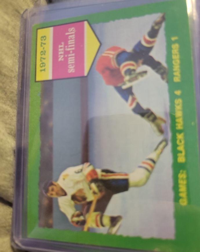 1973-74 Topps #196 NHL Semi-Finals Black Hawks 4 Rangers 1 — front