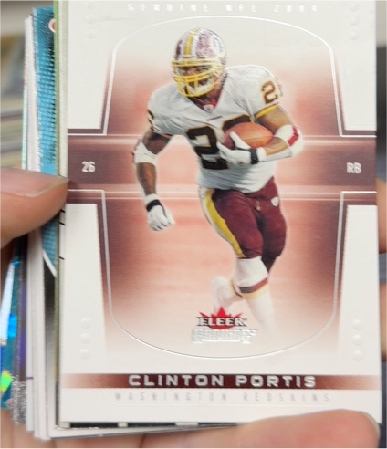 2004 Fleer Genuine #34 Clinton Portis — front