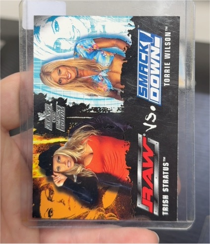 2002 Fleer WWE Raw vs SmackDown #82 Trish Stratus vs Torrie Wilson — front