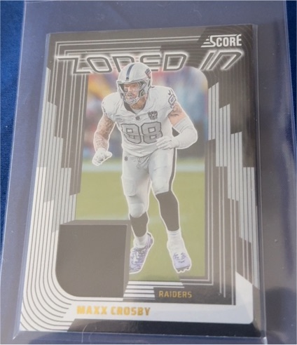2025 Panini Score Zoned In Jersey Maxx Crosby — front