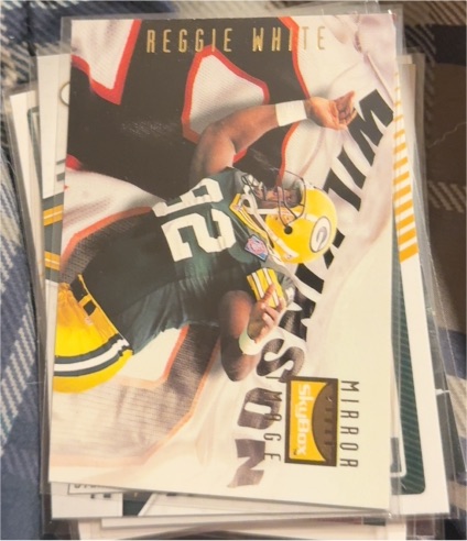1995 SkyBox Premium #156 Reggie White — front