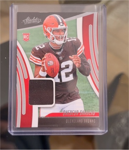 2025 Panini Absolute Rookie Materials #ARM-SSS Shedeur Sanders — front