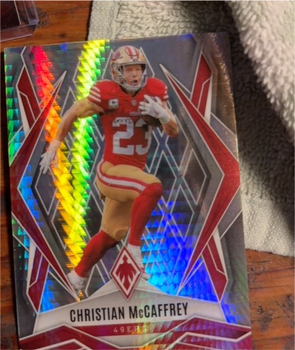 2025 Panini Phoenix #34 Christian McCaffrey — front