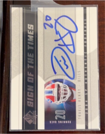2004 SP Authentic Sign of the Times #SOT-TH Travis Henry — front