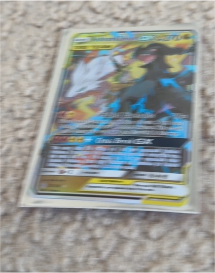 2019 Pokemon #36 Reshiram & Zekrom GX — front