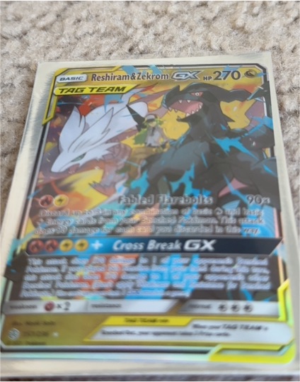 2019 Pokémon TCG Cosmic Eclipse #157 Reshiram & Zekrom GX — front