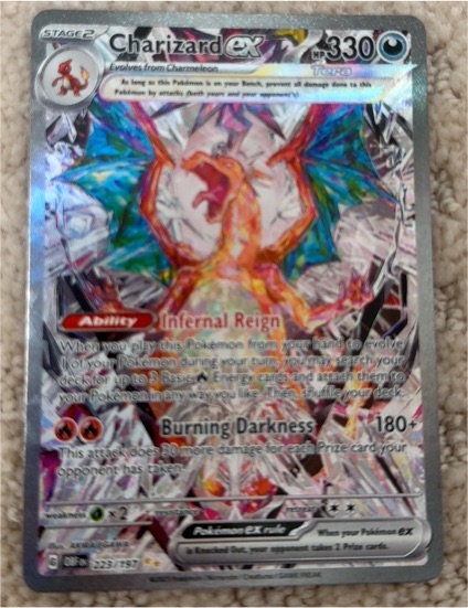 2023 Pokémon Charizard ex #223/197 — front