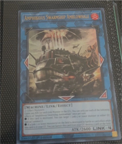 Yu-Gi-Oh! Quarter Century Stampede RA04-EN077 Amphibious Swarmship Amblowhale — front