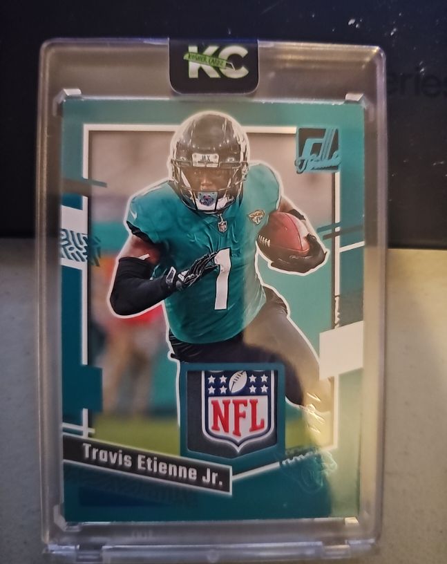 2023 Panini Football #KC Travis Etienne Jr. — front