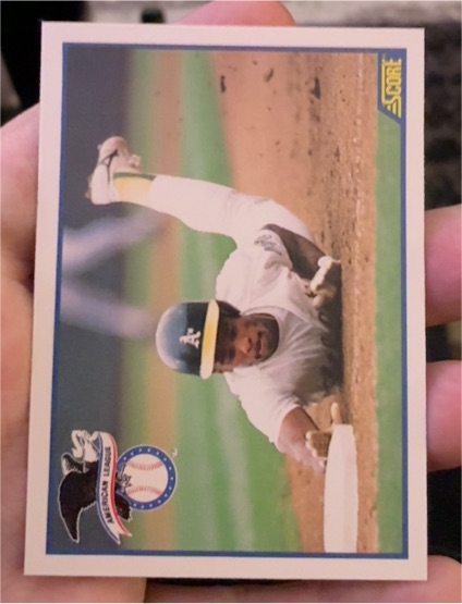 1990 Score #698 Rickey Henderson — front