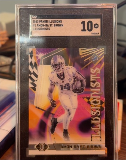 2023 Panini Illusions #1 Amon-Ra St. Brown Illusionists — front