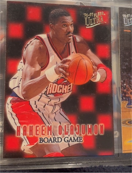 1996-97 Fleer Ultra #13 Hakeem Olajuwon Board Game — front