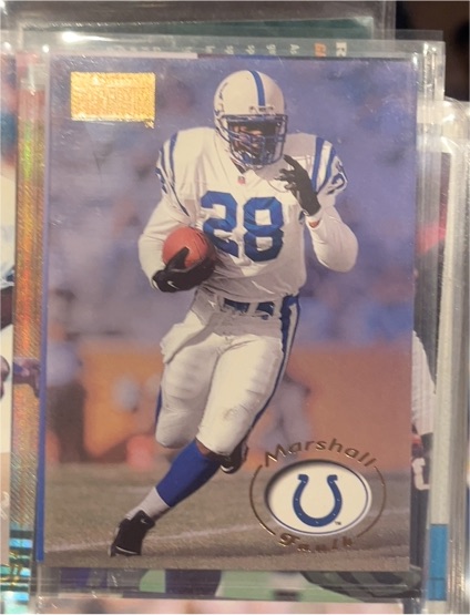 1996 Skybox Premium #75 Marshall Faulk — front