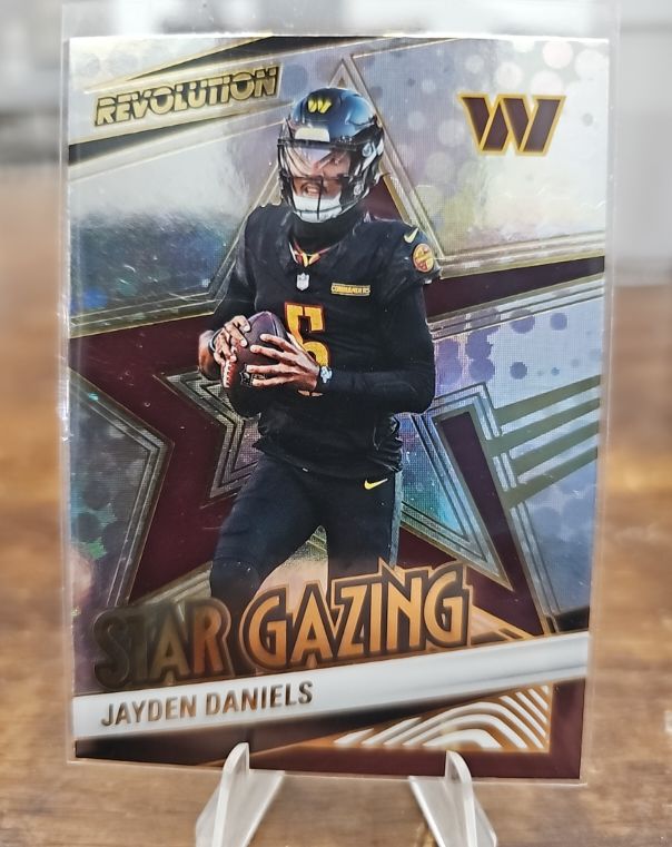 2025 Panini Revolution #23 Jayden Daniels Star Gazing — front