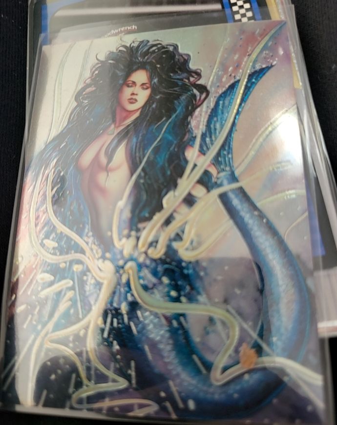 1994 Comic Images The Best of Olivia Chromium Promo Card — front
