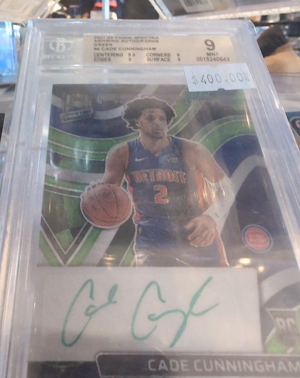 2021 Panini Spectra Aspiring Autographs Green #/50 Cade Cunningham — front