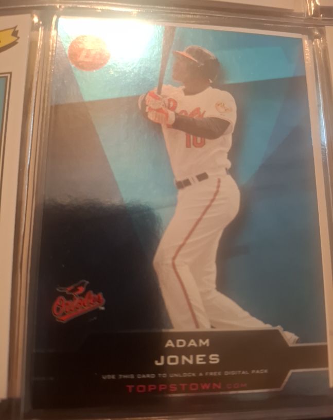 2011 Topps Toppstown #TT-9 Adam Jones — front