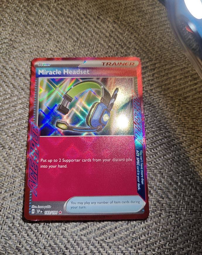2022 Pokémon TCG SV08 Surging Sparks #183 Miracle Headset — front