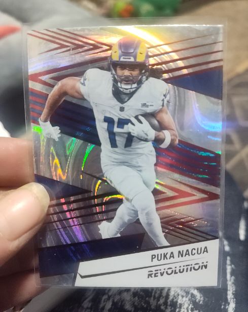 2025 Panini Revolution #25 Puka Nacua — front