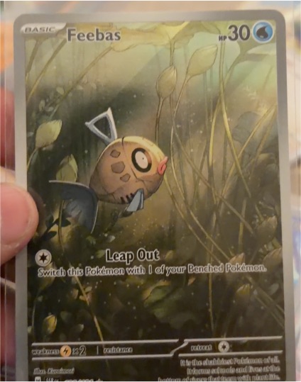 2023 Pokémon TCG SV08: Surging Sparks #198 Feebas Illustration Rare — front