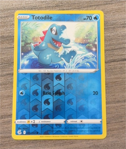 2021 Pokemon SWSH08 Fusion Strike #55 Totodile — front