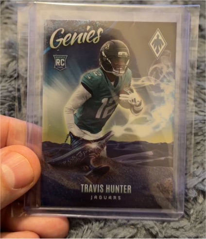 2025 Panini Phoenix Genies #12 Travis Hunter — front