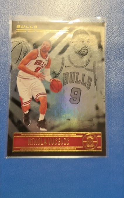 2020-21 Panini Illusions #13 Nikola Vucevic — front