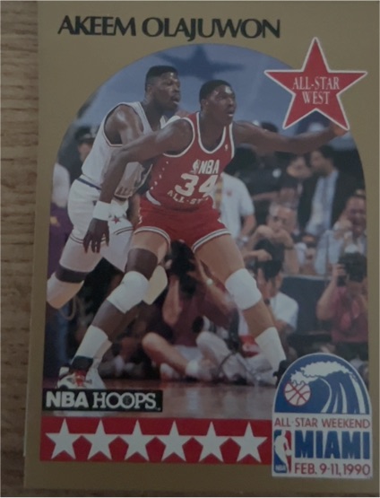 1990-91 Hoops #23 Akeem Olajuwon — front
