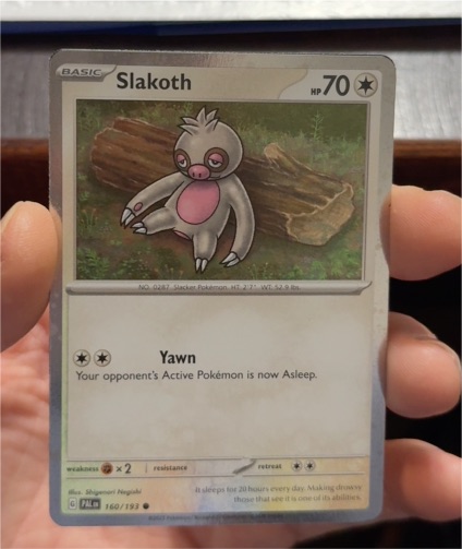 2023 Pokémon TCG Paldea Evolved #160 Slakoth Cosmos Holo — front