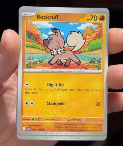 2025 Pokémon Journey Together #084 Rockruff — front