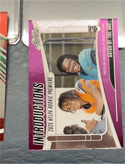2025 Panini Absolute #I-THR Travis Hunter/Pat Bryant Catch of the Day Introductions Rookie Card — front