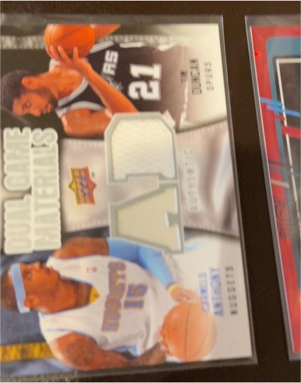 2009 Upper Deck Dual Game Materials #DG-NK Michael Jordan/Carmelo Anthony — front