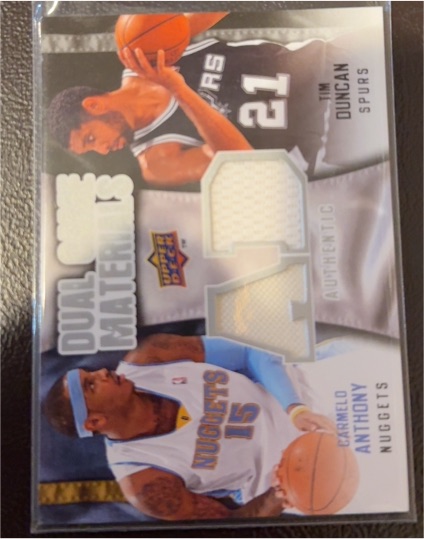 2009-10 Upper Deck Dual Game Materials #DG-MA Tim Duncan / Carmelo Anthony — front