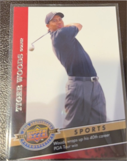 2009 Upper Deck 20th Anniversary Retrospective Sports Tiger Woods #1879 — front