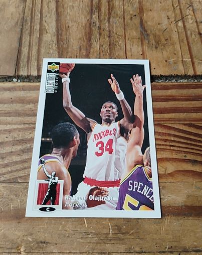 1994-95 Upper Deck Collector's Choice #34 Hakeem Olajuwon — front