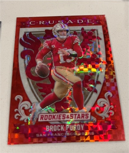 2025 Panini Rookies & Stars #10 Brock Purdy Crusade — front
