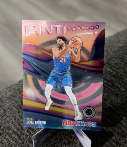 2023-24 Panini NBA Hoops Premium Stock #7 Joel Embiid Anti-Gravity — front