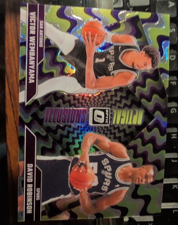 2024-25 Donruss Optic #5 David Robinson/Victor Wembanyama Optical Illusions — front
