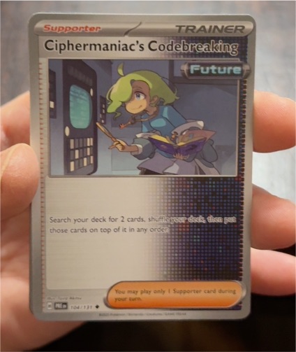 2025 Pokémon Prismatic Evolutions #104 Ciphermaniac's Codebreaking — front