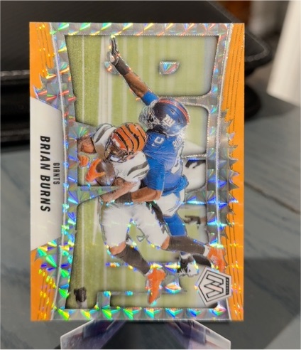 2025 Panini Mosaic #7 Brian Burns Bang! Mosaic Orange Fluorescent — front