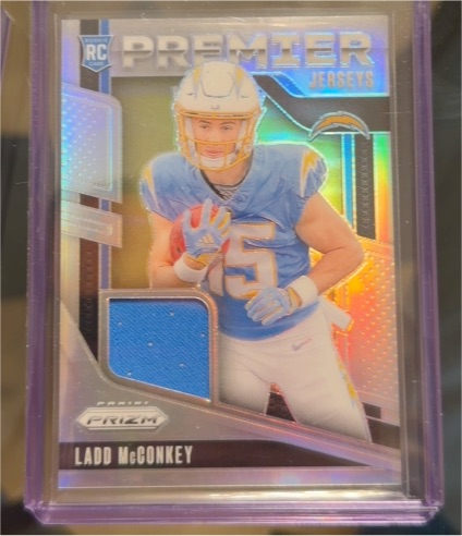 2024 Panini Prizm Premier Jerseys #PJ-LMY Ladd McConkey — front