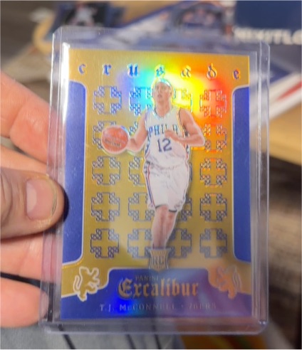 2015-16 Panini Excalibur Crusade Blue #12 T.J. McConnell — front