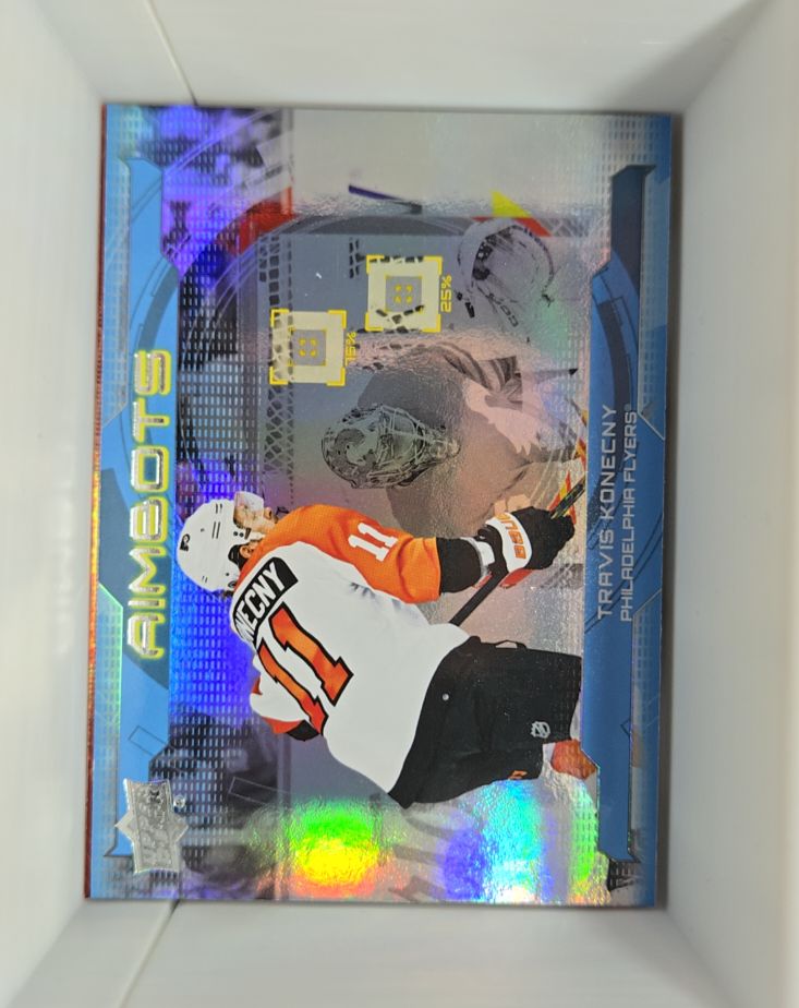 2024-25 Upper Deck Series 1 Aimbots #AB-24 Travis Konecny — front