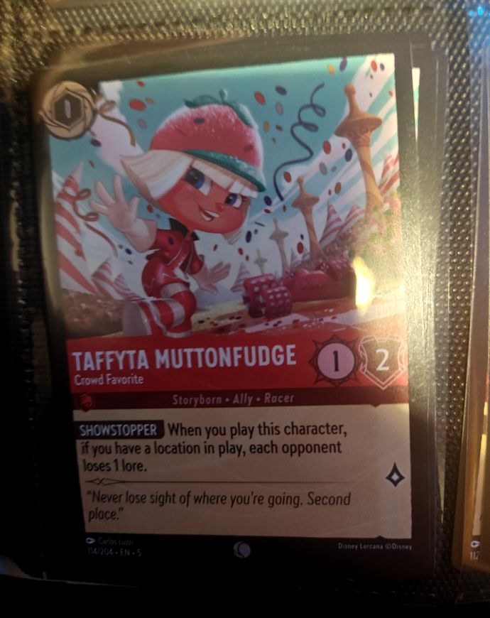 Disney Lorcana Shimmering Skies #114 Taffyta Muttonfudge — front